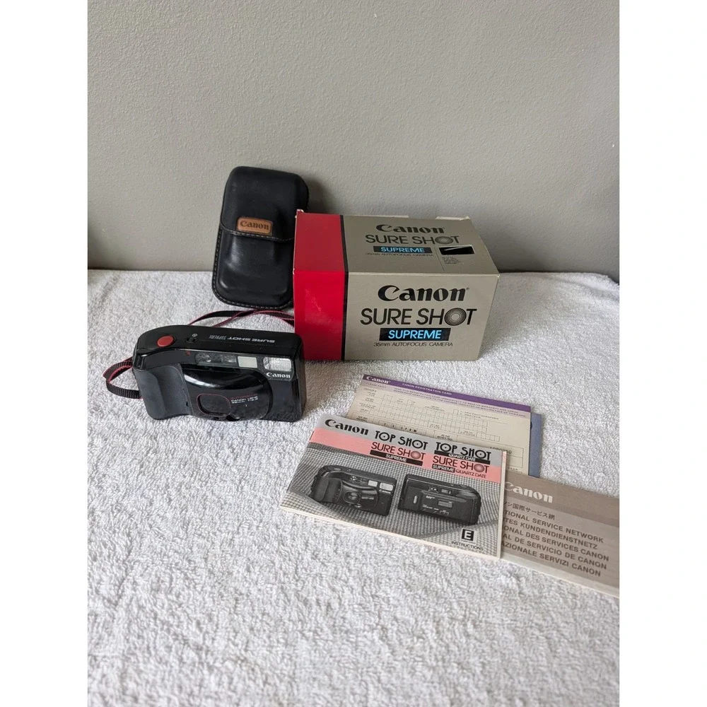 Canon Sure Shot Supreme 35mm Camera Autofocus w/OEM Box Manual Needs Battery
